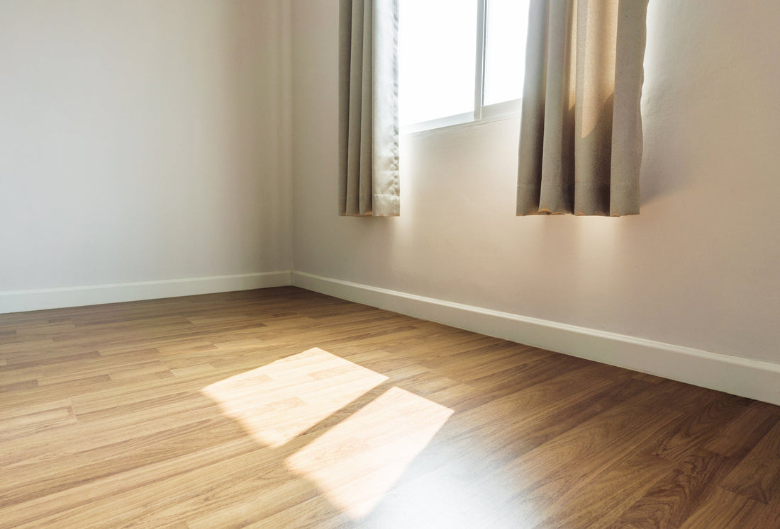 brown agt laminate flooring in a bedroom